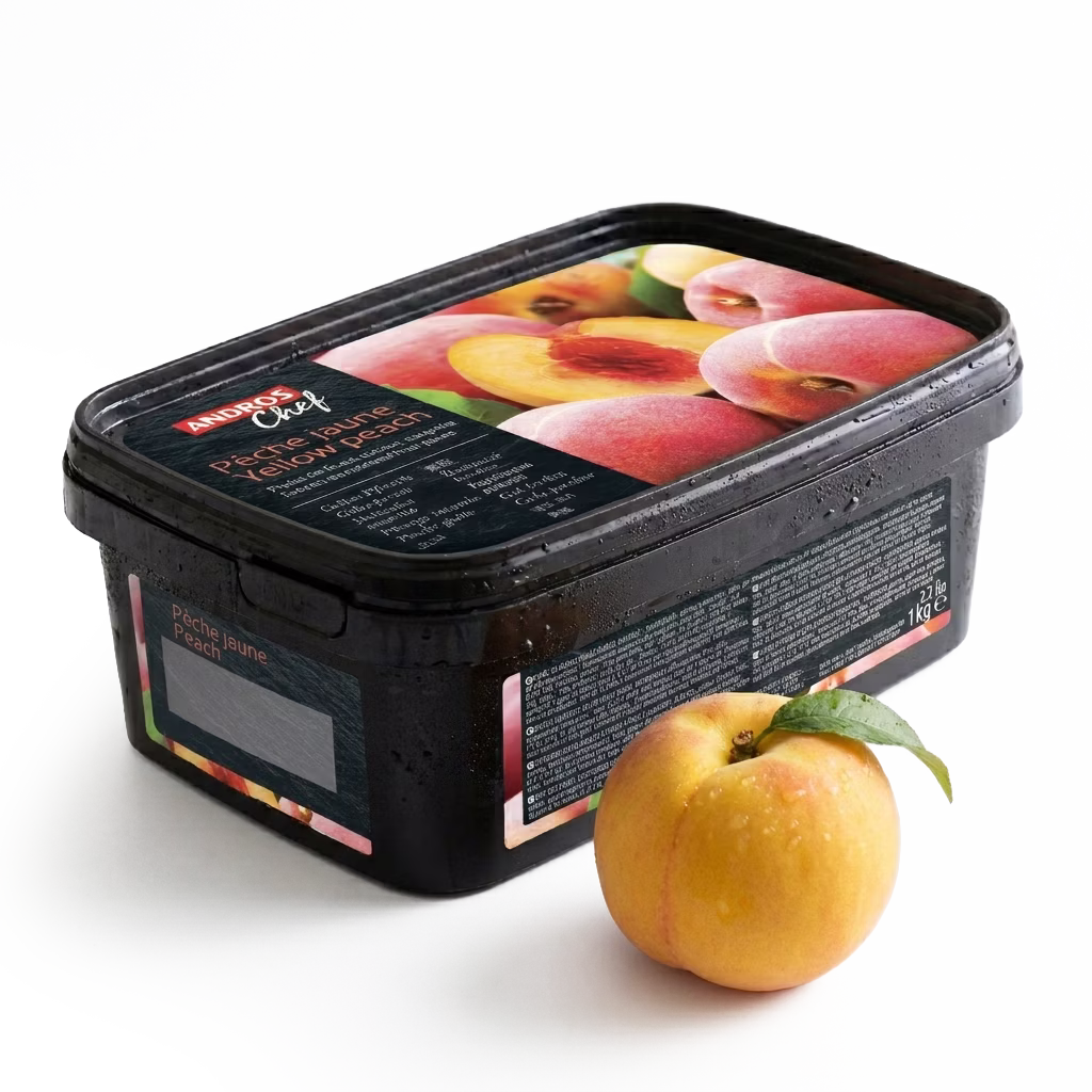 Puré de durazno amarillo congelado Andros elaborado con fruta seleccionada, ideal para mousses, sorbetes, helados y repostería profesional.